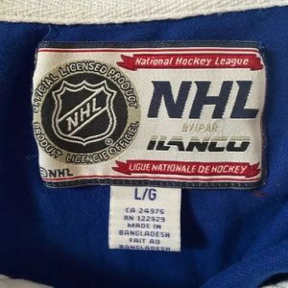 NHL Royal Blue Polo with White Maple Leaf Logo - Picture 3 of 5